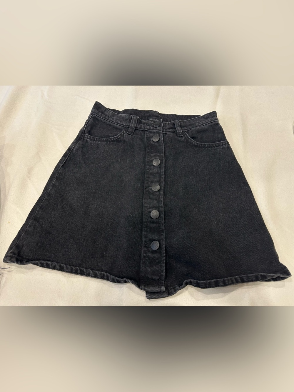 Women’s black denim skirt
